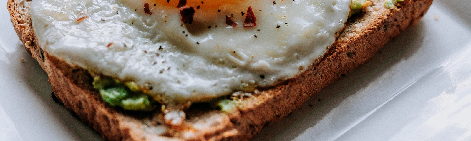 Fried egg on a slice of toast on a plate